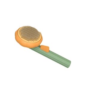 Self-cleaning slicker brush with orange head and green handle on white