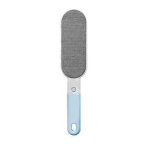 Pet hair remover brush with blue handle and grey lint pad on white