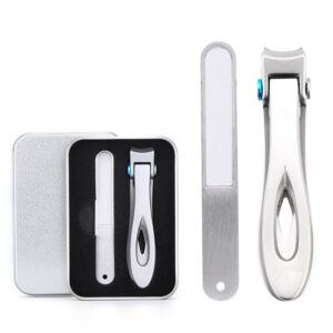 Nail clipper set in an open silver tin with a large silver clipper and a nail file in black foam