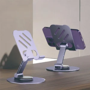 Metal desktop phone stand holding a smartphone at an angle on a desk