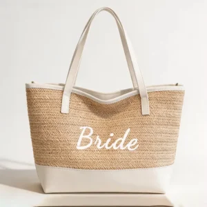Large woven beach bag shown fully packed with towel and essentials