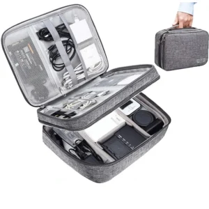 A traveler organizing cables in a waterproof portable digital storage bag
