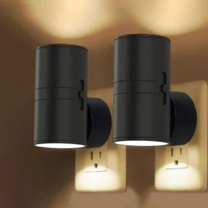 Cylinder LED night light plugged into a hallway wall outlet