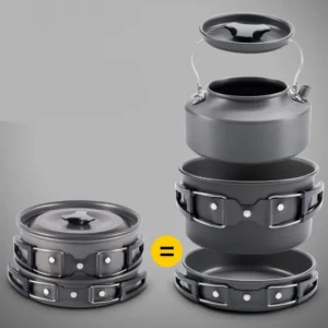 A portable stove combination set with multiple utensils laid out on a camping table.